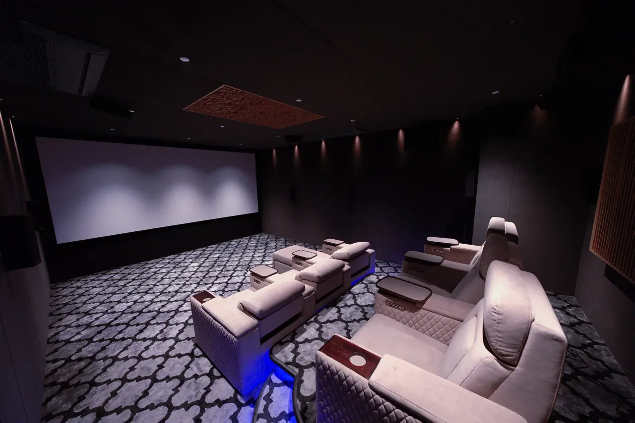 USK Berkeley Cinema private theatre with tiered recliner seating and projection screen
